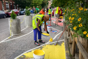 Sweet 27 Parklet Pavement Mural install team ladeling