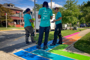 Hyattsville Quilted Crossing team in Make Place Happen t-shirts