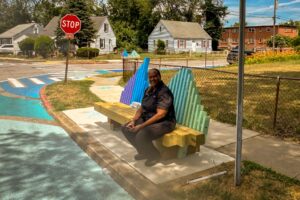 Annapolis Eastport Wave bench perspective with resident waiting for the bus