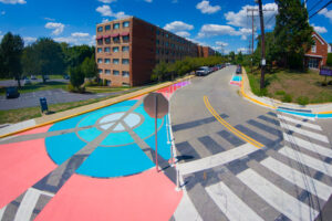 Rays of Peace birds eye view at Nicholson & 30th with large peace sign in the middle