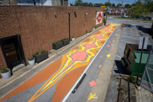 Lortz Lane LortzWave shared street pavement art birds eye view facing east