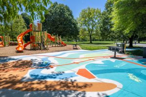 Waters Landing Creek to Lake mural perspective featuring playground in background