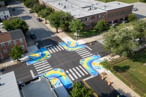 Franklin Square EMS Heraldic Bands birds eye view with school in background