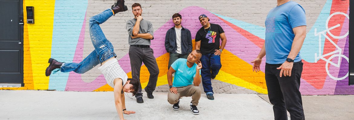 Graham Projects core team outside of the Trenton Art Garage doing silly poses.