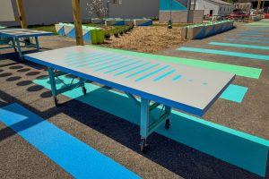 2700 Art Space moveable table from reclaimed trusses