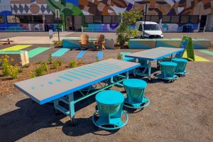 2700 Art Space tables and stools made from reclaimed materials set up for workshop