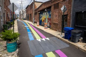 Lady Day Way Rhythm of Billie perspective view of speed hump with garage mural