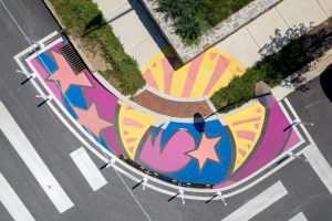 3rd & Patapsco Celestial Crossings aerial view of south bump out with moon and stars mural